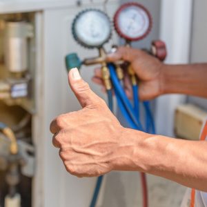 hvac technician giving thumbs up